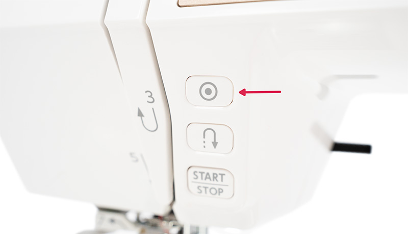 Janome 5300QDC Stitch lock-off button